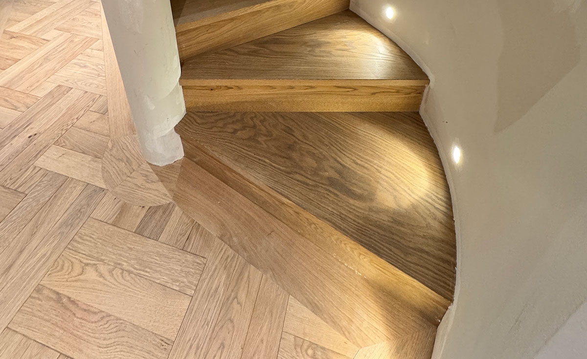refurbishment-wooden-stairs-london image of a sander refinishing hardwood floors