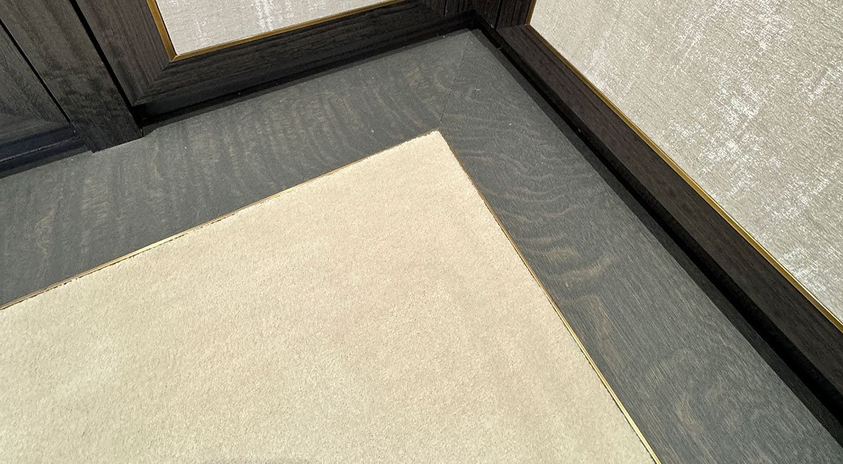 wooden-edging-in-private-home image of concrete floor being laid before engineered wood flooring